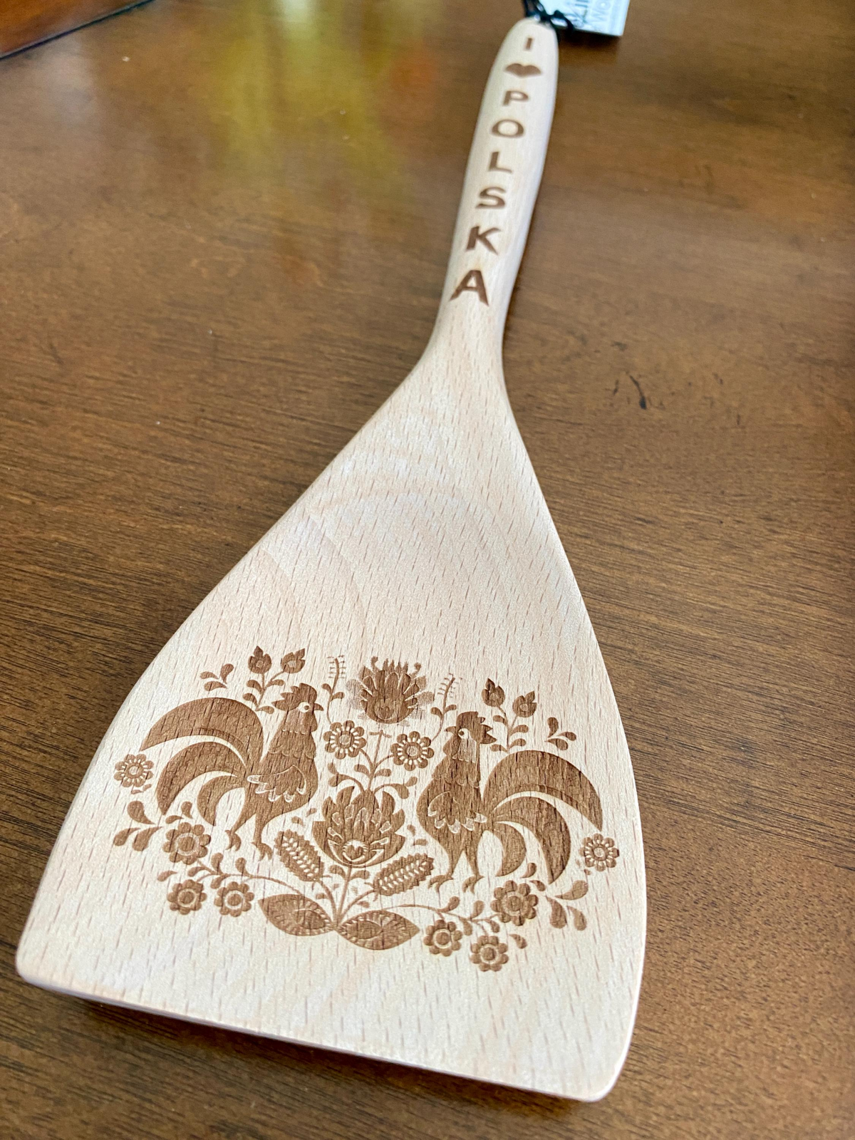 Laser engraved wooden utensil with Polish folk rooster and floral design